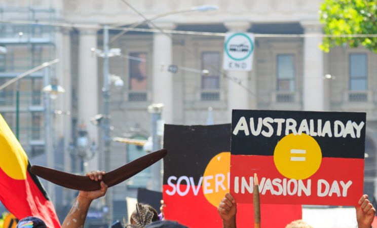 Indigenous rights protesters marching in the CBD during the Invasion Day