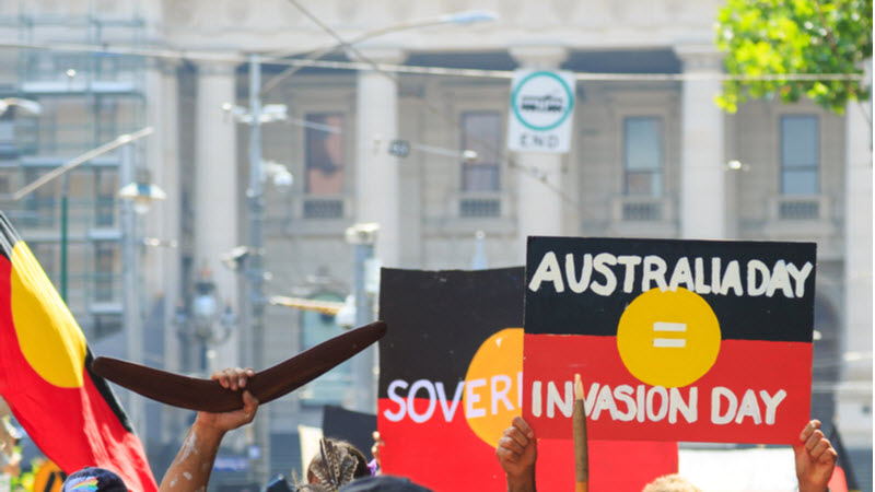 Indigenous rights protesters marching in the CBD during the Invasion Day